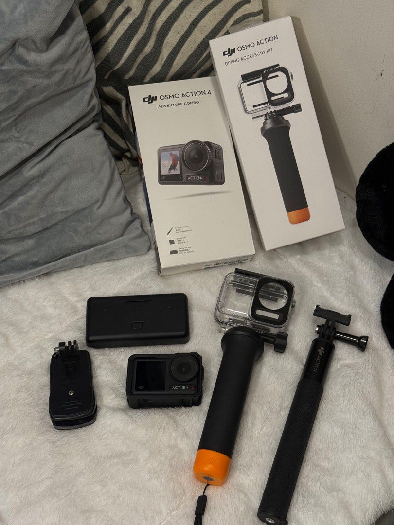 DJI Osmo Action 4 + 2 Sticks etc (Category: Cameras) located in Cabuyao City. Submitted by cleaningoutmycloset.ph (Listing ID 1354181960, Image 2). Description: UPDATE: Selling for 16000 is getting this weekend!!!! DJI Osmo Action 4 bought for 28,890 in Sep 2023, includes 3 batteries, action stick and case, underwater stick and backpack/dress pin-on. Used only during 2024 travels to Thailand and Palawan. Worked really well underwater and tracking