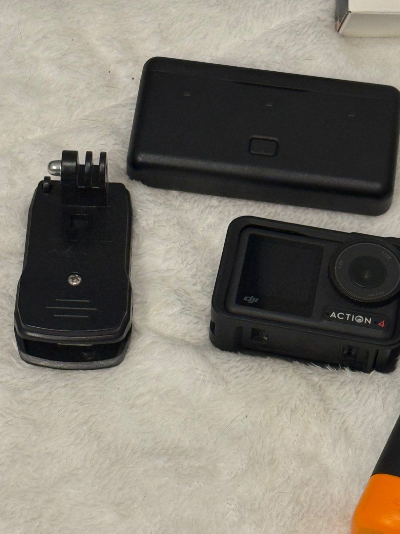 DJI Osmo Action 4 + 2 Sticks etc (Category: Cameras) located in Cabuyao City. Submitted by cleaningoutmycloset.ph (Listing ID 1354181960, Image 3). Description: UPDATE: Selling for 16000 is getting this weekend!!!! DJI Osmo Action 4 bought for 28,890 in Sep 2023, includes 3 batteries, action stick and case, underwater stick and backpack/dress pin-on. Used only during 2024 travels to Thailand and Palawan. Worked really well underwater and tracking