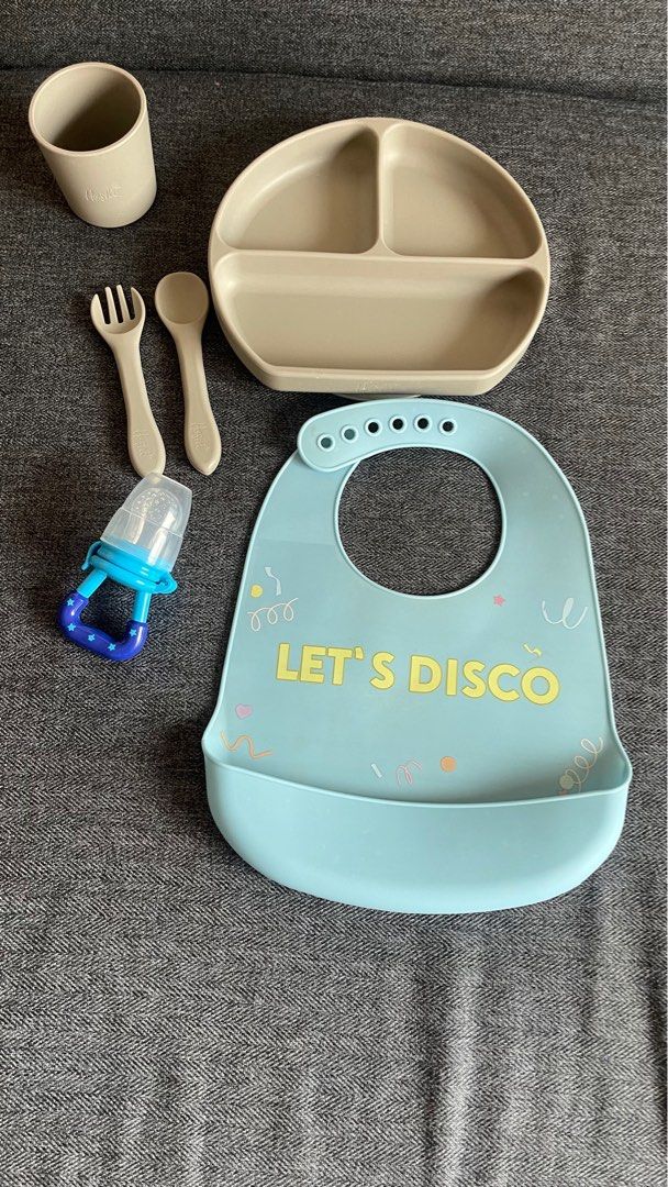 Hoshi Baby Feeding Set (Category: Weaning & Toddler Feeding) located in Manila. Submitted by prtysxychq (Listing ID 1354176658, Image 1). Description: Rarely used. Gray Silicone Suction Plate Gray Spoon and Fork Gray Glass Blue Bib Freebie: fruit pacifier.