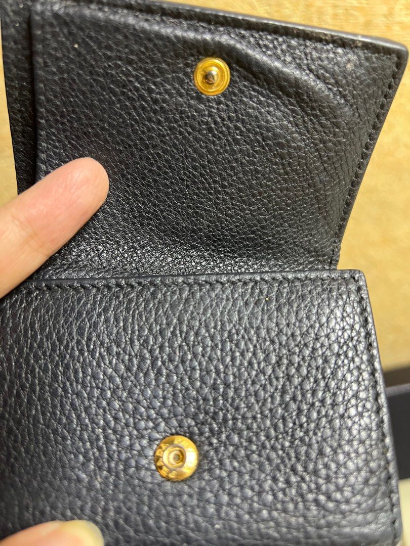 Prada Trifold Compact Wallet (Category: Luxury Bags & Wallets) located in Quezon City. Submitted by prelovica (Listing ID 1354171370, Image 3). Description: 100% Authentic with box and authenticity card .