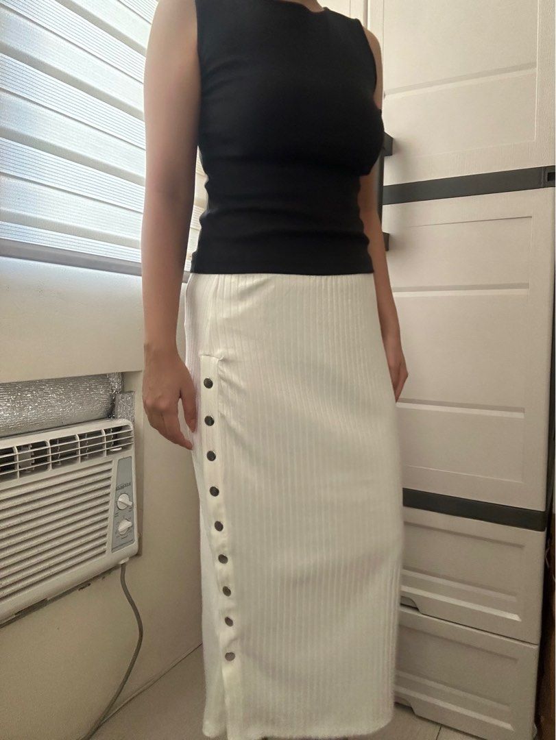 Shein white maxi skirt with studded side design (Category: Skirts) located in Makati City. Submitted by longflighty (Listing ID 1354178121, Image 1). Description: white maxi midi coquette femme cleangirl studded skirt brand new never worn bought in USA waist too big for me but can be worn low waist no flaw tag says its xl but better refer to the measurements Dimensions: Waist 32” L 30” On-hand and ready to ship Negotiable No refunds/returns polic