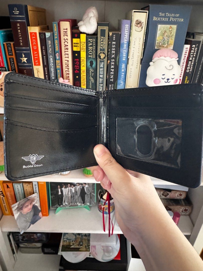 AUTHENTIC HARRY POTTER MERCHANDISE - Ravenclaw wallet (Category: Wallets & Card holders) located in Muntinlupa City. Submitted by trishveezy (Listing ID 1354397768, Image 2). Description: Never used Pero nabakbak na yung leather sa loob because of humidity. MOP: GCash/BDO MOD: JRS or same day delivery (buyer to book).