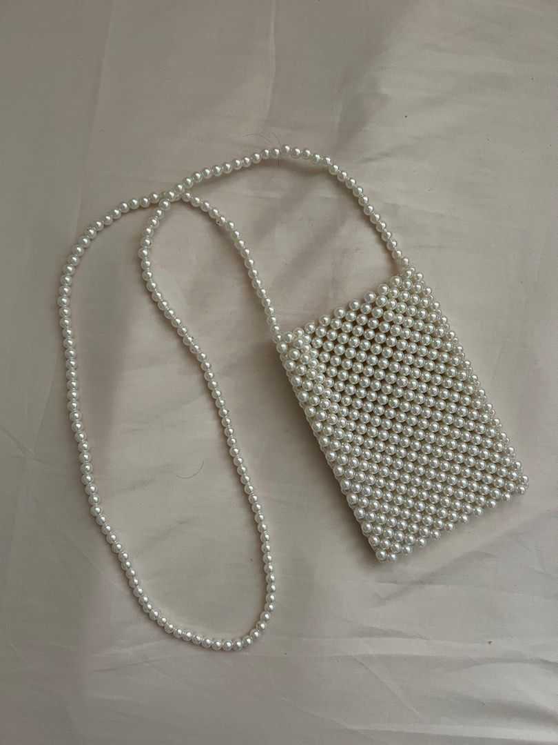 Beaded Pearl Bag (Category: Purses & Pouches) located in Mandaluyong City. Submitted by e___j (Listing ID 1354422076, Image 2). Description: Long beaded pearl bag Given so not sure where from; used only a few times!.