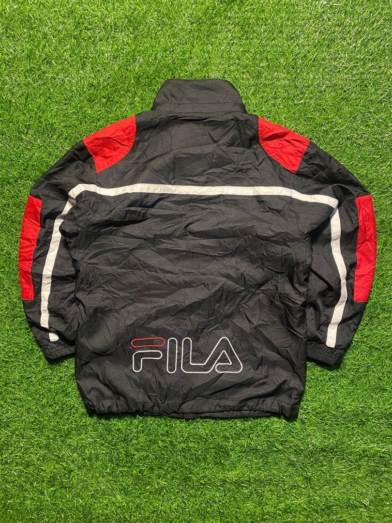 FILA Windbreaker(Women size) (Category: Coats, Jackets and Outerwear) located in Cebu City. Submitted by jackofallthrift (Listing ID 1354503543, Image 2). Description: Width:18 Length:22/23 Fits to S-M Cr:9.5/10 Missing Hood.
