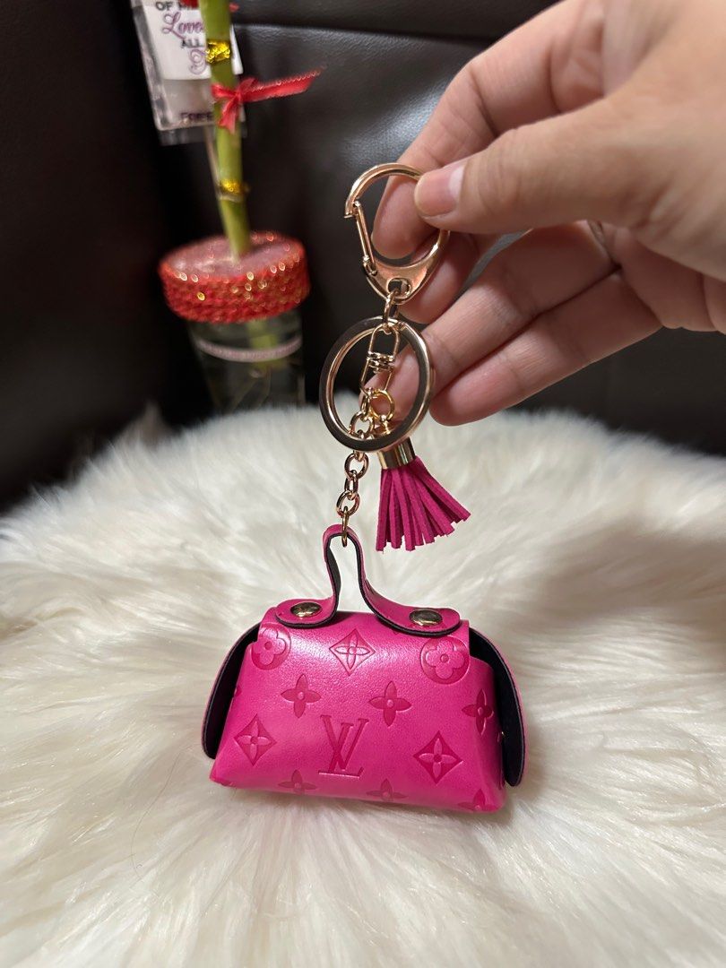 Louis Vuitton Coin Purse/Bag Charm (Category: Luxury Bags & Wallets) located in Mandaue City. Submitted by ludz_0246 (Listing ID 1354464771, Image 2). Description: Gold Handware Fuschia Pink Coin Purse Bag Charm No flaw Korea Source.
