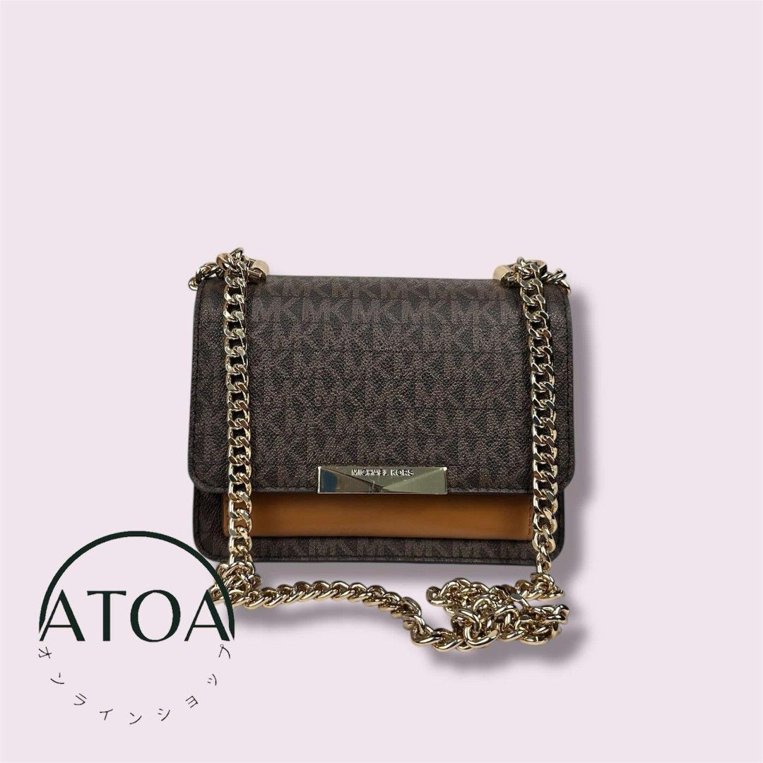 MICHAEL KORS Jade Shoulder Bag (Category: Luxury Bags & Wallets) located in Pasay City. Submitted by atoaph (Listing ID 1354514293, Image 2). Description: PRELOVED MICHAEL KORS JADE Shoulder Bag 💯 PERCENT OG/AUTHENTIC - 🇯🇵 sourced Rank: SA Color: Brown Size Approx: L18cm W7cm H14cm Material: Coated canvas leather Hardware: Gold tone PRICE IS SLIGHTLY NEGOTIABLE. Note: Items were photographed using a digital camera. The actual color and texture