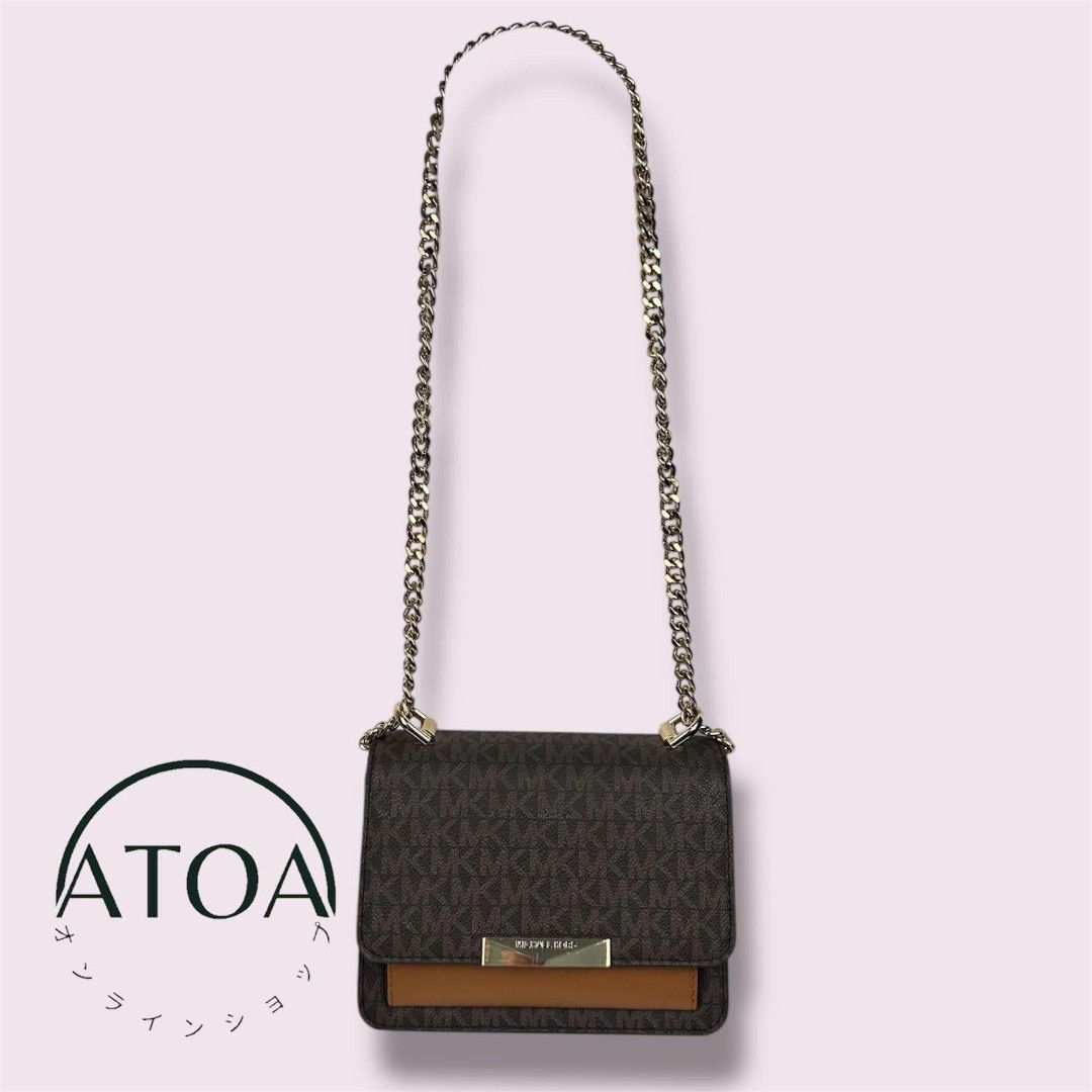 MICHAEL KORS Jade Shoulder Bag (Category: Luxury Bags & Wallets) located in Pasay City. Submitted by atoaph (Listing ID 1354514293, Image 1). Description: PRELOVED MICHAEL KORS JADE Shoulder Bag 💯 PERCENT OG/AUTHENTIC - 🇯🇵 sourced Rank: SA Color: Brown Size Approx: L18cm W7cm H14cm Material: Coated canvas leather Hardware: Gold tone PRICE IS SLIGHTLY NEGOTIABLE. Note: Items were photographed using a digital camera. The actual color and texture