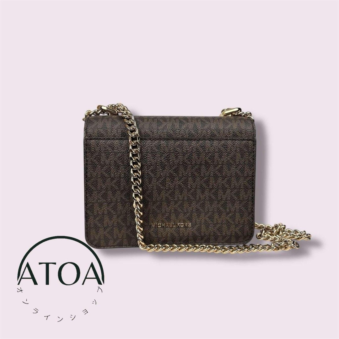 MICHAEL KORS Jade Shoulder Bag (Category: Luxury Bags & Wallets) located in Pasay City. Submitted by atoaph (Listing ID 1354514293, Image 3). Description: PRELOVED MICHAEL KORS JADE Shoulder Bag 💯 PERCENT OG/AUTHENTIC - 🇯🇵 sourced Rank: SA Color: Brown Size Approx: L18cm W7cm H14cm Material: Coated canvas leather Hardware: Gold tone PRICE IS SLIGHTLY NEGOTIABLE. Note: Items were photographed using a digital camera. The actual color and texture