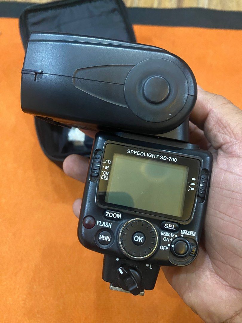 Nikon SB700 Speedlight (Category: Cameras) located in Tanay. Submitted by bentomendez (Listing ID 1354369686, Image 3). Description: Sale/Trade: Nikon SB-700 Speedlight Excellent condition You can use it with other mounts on Manual Mode. Comes with the following: Flash unit SS-700 pouch Diffuser Incandescent and Flourescent Filters Flash stand Hadsan Q-bank 60cm Octabox Quick setup Complete with carrying case, flash holder, inner diffusion cloth,