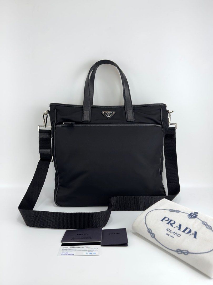 Prada laptop bag (Category: Luxury Bags & Wallets) located in Manila. Submitted by luxuryprelovedbagsby_by_agnes (Listing ID 1353339037, Image 1). Description: A P r A D @ classic, this tessuto nylon Re-edition handbag is perfect for everyday wear or travel. The spacious interior can fit all your necessities. It has a zip top closure to keep your belongings safe and secure as well as an interior slip pocket. On the exterior. The detachable crossb