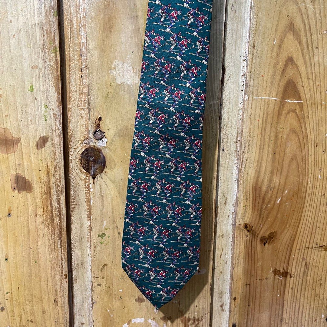 Salvatore Ferragamo Necktie (Category: Luxury Accessories) located in Baguio. Submitted by goodfinds2600v2 (Listing ID 1354429184, Image 2). Description: Size: Dimensions: L-56 W- Description: Condition: Very Good Issue: small holes .