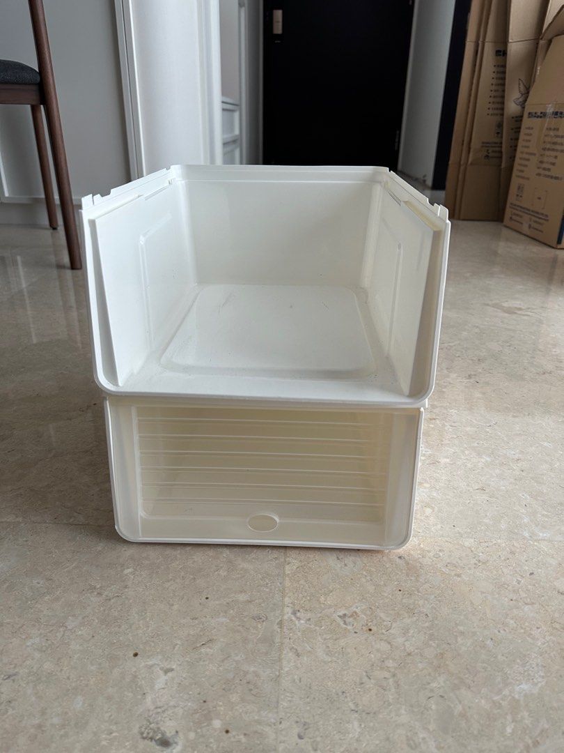Stackable Shoe Box (Category: Storage Boxes & Baskets) located in Singapore. Submitted by gingko_lola (Listing ID 1354375937, Image 3). Description: Stackable shoes boxes, with lid that can be lifted. I have 18 available. Collection from River Valley/ Killiney road. $3 each. $10 for 4. Width 27cm, length 34cm, height 15cm.