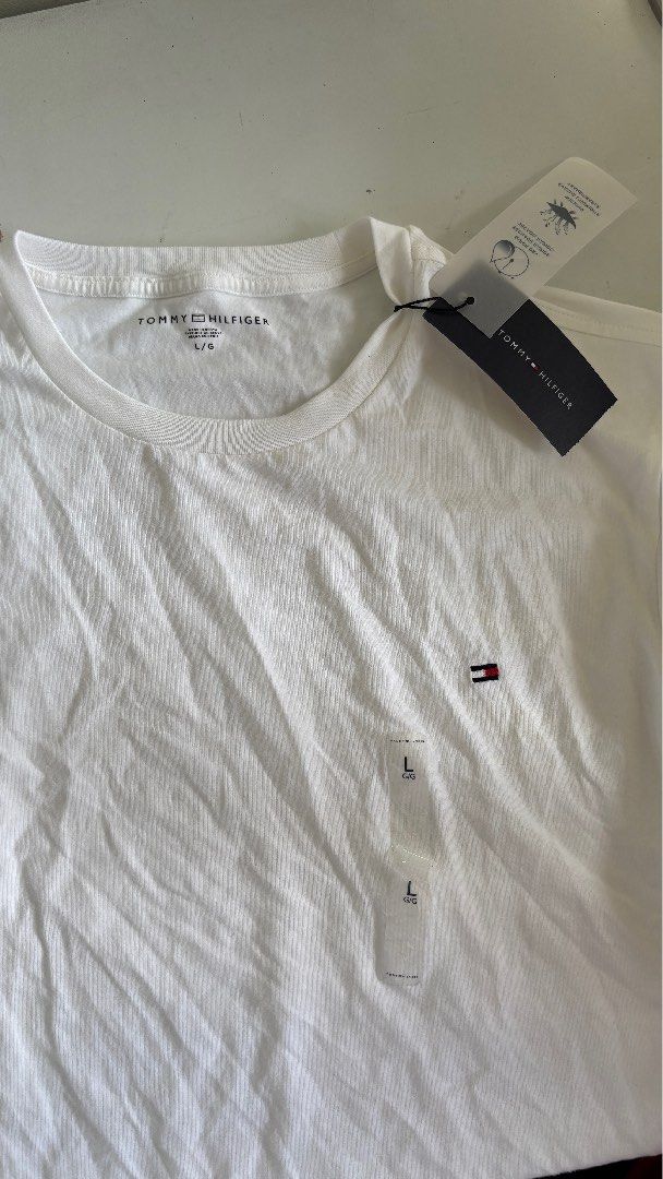Tommy Hilfiger White Shirt (Category: Tshirts & Polo Shirts ) located in Makati City. Submitted by foojustin (Listing ID 1354403430, Image 1). Description: Brand new with tags. Issue: needs ironing. Stocked. .