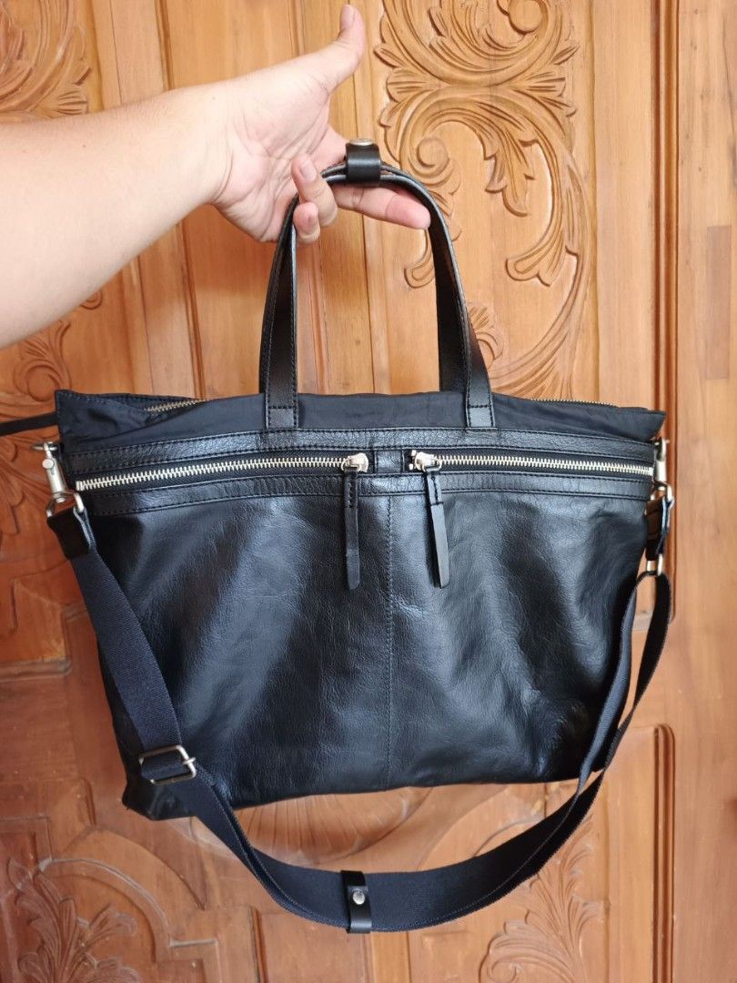 Yohji Yamamoto (Y'saacs) Two way bag black Leather (Category: Luxury Bags & Wallets) located in Digos. Submitted by danteselected84 (Listing ID 1354404084, Image 1). Description: Yohji Yamamoto (Y'saacs) Two way bag black Leather 5 Compartment zip w/cellphone and ballpen pocket inside 16W BY12L inch size all zipper are in smooth condition all in prestine condition 10/10 Color rate 100% authentic no issue Location: Digos City, Davao del sur.