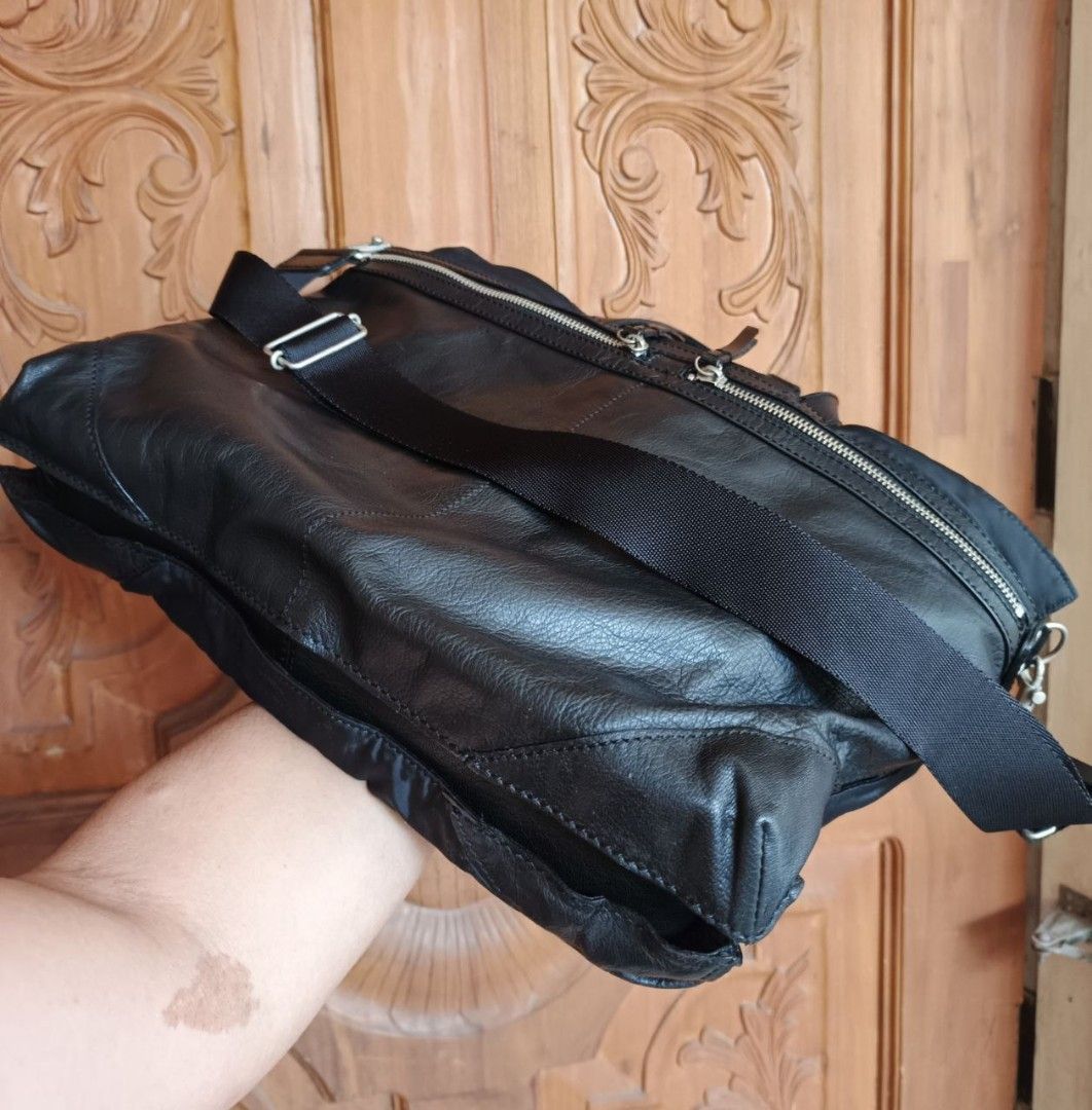Yohji Yamamoto (Y'saacs) Two way bag black Leather (Category: Luxury Bags & Wallets) located in Digos. Submitted by danteselected84 (Listing ID 1354404084, Image 2). Description: Yohji Yamamoto (Y'saacs) Two way bag black Leather 5 Compartment zip w/cellphone and ballpen pocket inside 16W BY12L inch size all zipper are in smooth condition all in prestine condition 10/10 Color rate 100% authentic no issue Location: Digos City, Davao del sur.