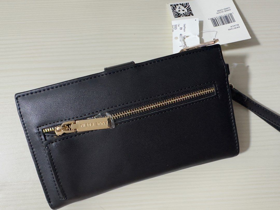 Anne Klein Wallet (SUPER SALE) (Category: Wallets & Card holders) located in Mandaluyong City. Submitted by tech-projekt (Listing ID 1354674096, Image 3). Description: BNEW Black Anne Klein Wallet Card Holder From CANADA Still has soe plastics on Size: Width is 7.5 inch and height is 4.5 inch.