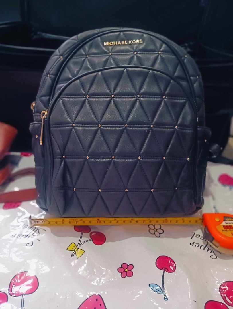 AUTHENTIC MICHAEL KORS QUILTED BACKPACK WITH GOLD ACCENTS 2,200 (Category: Luxury Bags & Wallets) located in General Trias. Submitted by 09459757233 (Listing ID 1354615064, Image 1). Description: AUTHENTIC MICHAEL KORS ABBEY QUILTED BACKPACK WITH GOLD ACCENTS.
