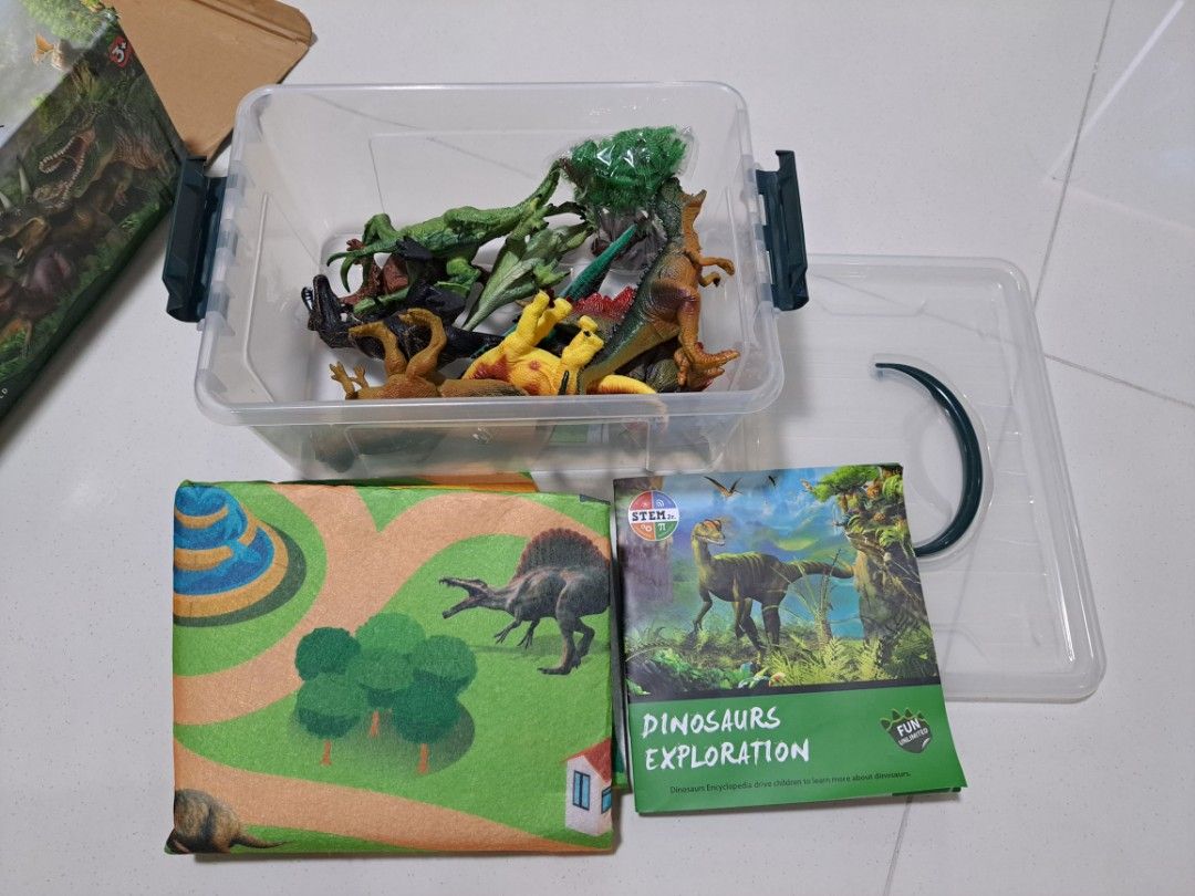 DINOSAUR (Category: Toy Figures) located in Singapore. Submitted by sin78 (Listing ID 1354644821, Image 3). Description: Brand new box of dinosaur figurines for clearance. My son got it as a gift but he had never played with it. Just opened up to see. Take this at $5. Self pick up only.