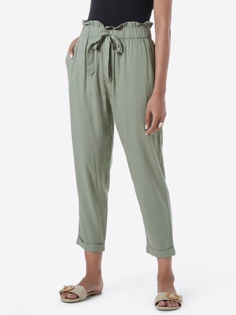 H&M green paperbag trousers (Category: Other Bottoms) located in Quezon City. Submitted by mobynmible (Listing ID 1354691548, Image 1). Description: Used twice or thrice! Very comfy and flowy Rfs: not my style anymore Best fits: XS-S.