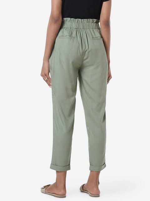 H&M green paperbag trousers (Category: Other Bottoms) located in Quezon City. Submitted by mobynmible (Listing ID 1354691548, Image 2). Description: Used twice or thrice! Very comfy and flowy Rfs: not my style anymore Best fits: XS-S.