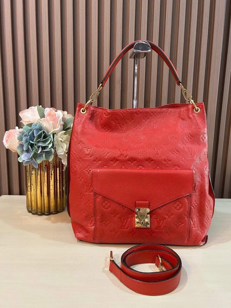 LV Metis Hobo MM Bag (Category: Luxury Bags & Wallets) located in Manila. Submitted by bagislifeshop (Listing ID 1354712035, Image 1). Description: ☑️Available in Pampanga ✅Date code: CA2123 ✅Condition: 8.5/10 ✅Material: Empreinte leather ✅Color: Red ✅Inclusions: Replacement dustbag, short and long straps .