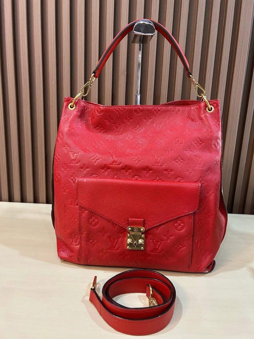 LV Metis Hobo MM Bag (Category: Luxury Bags & Wallets) located in Manila. Submitted by bagislifeshop (Listing ID 1354712035, Image 2). Description: ☑️Available in Pampanga ✅Date code: CA2123 ✅Condition: 8.5/10 ✅Material: Empreinte leather ✅Color: Red ✅Inclusions: Replacement dustbag, short and long straps .