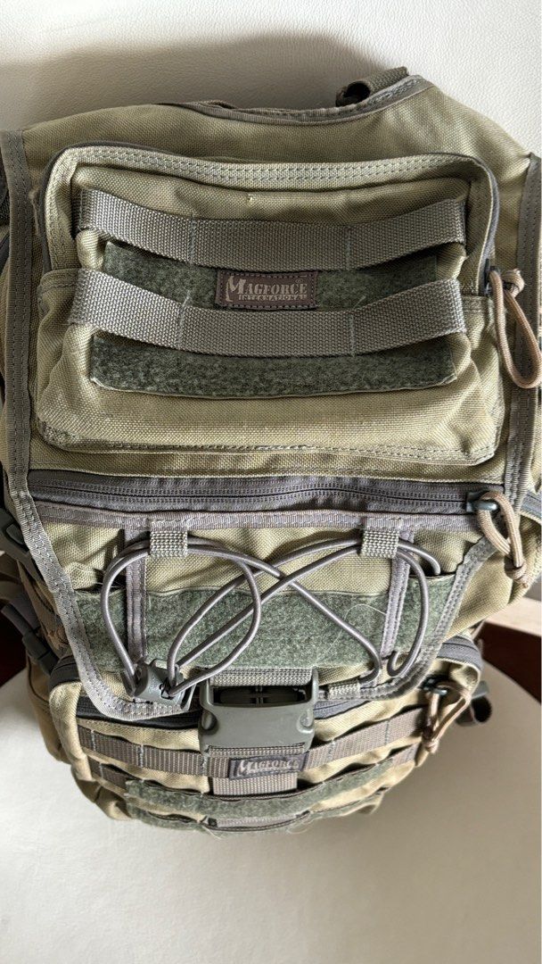 Magforce Cakewalk Computer Backpack (Category: Backpacks) located in Singapore. Submitted by pepperchilli (Listing ID 1354612913, Image 5). Description: Cakewalk Computer Backpack Size: H490xW330xD230(mm) Material: 1050D MAGTEX Ballistic Nylon Capacity:37L Origin: Taiwan ▪ Plenty of MOLLE/PALS webbing for expansion. ▪ Side straps compress backpack, optimizing weight distribution. ▪ Thickly padded compartment for a 15” laptop. ▪ Interior medical/E