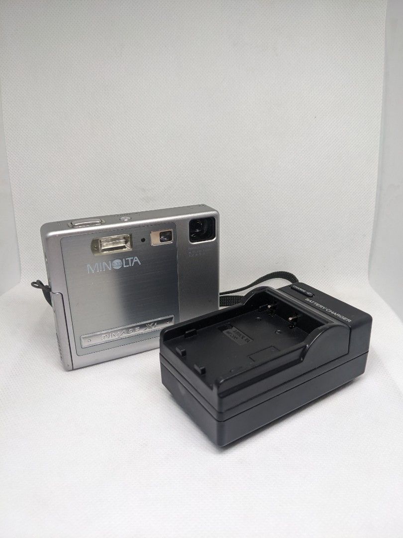 Minolta Dimage Xi (Category: Cameras) located in Manila. Submitted by sa_bahay (Listing ID 1354716521, Image 1). Description: Minolta Dimage Xi Digital Camera -fully functional -with brand new camera and charger -has LCD marks (refer to 4th photo) -Sample photos attached (5th to 7th photo).