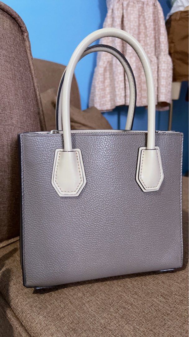 Original MK Mercer (Category: Luxury Bags & Wallets) located in Batangas. Submitted by labelle_botique (Listing ID 1354528711, Image 3). Description: Original MK Mercer 9/q10 condition Two toned in color No flaw Size Small .