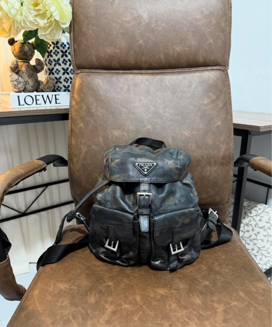 Prada leather Camouflage small backpack (Category: Luxury Bags & Wallets) located in San Pablo. Submitted by with.jacque (Listing ID 1354587010, Image 1). Description: Good condition 8/10 Bag only Has minor flaws but the bag is still in good condition .