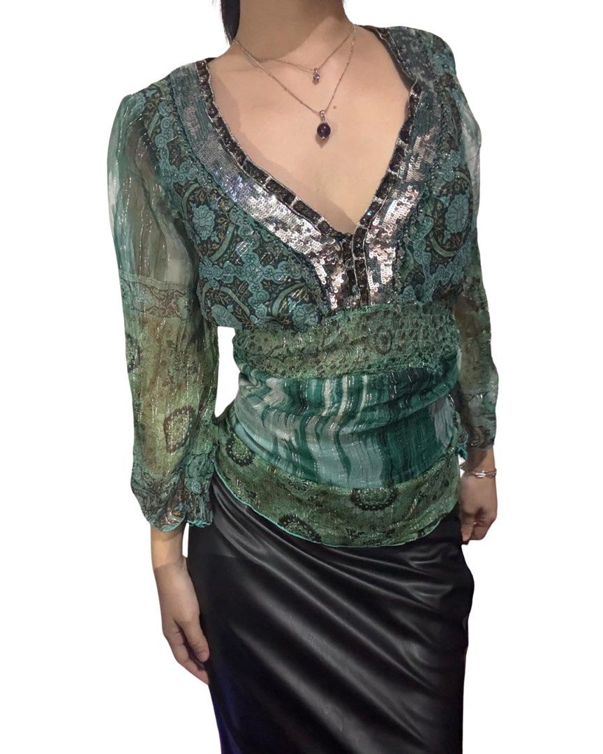 Sequined emerald top (Category: Blouses) located in Manila. Submitted by violoot (Listing ID 1354713496, Image 1). Description: S-M, best fits M clipped at the back .