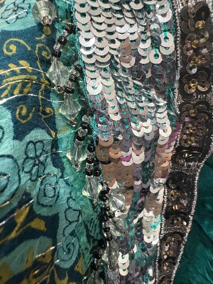 Sequined emerald top (Category: Blouses) located in Manila. Submitted by violoot (Listing ID 1354713496, Image 2). Description: S-M, best fits M clipped at the back .