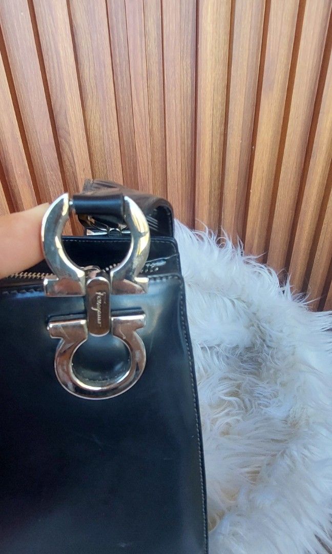 Vintage Salvatore ferragamo (Category: Luxury Bags & Wallets) located in Talavera. Submitted by trixielady08 (Listing ID 1354639122, Image 2). Description: coded naka salvatore ferragamo ang ilalim ng zipper may flaws❗️ bawal po ito sa maselan..para lang po sa mga collector🥰 flaws:natanggal ang tahi sa isang strap..kayo na po magpatahi. :di na po ganun kakintab ang patent leather nya..