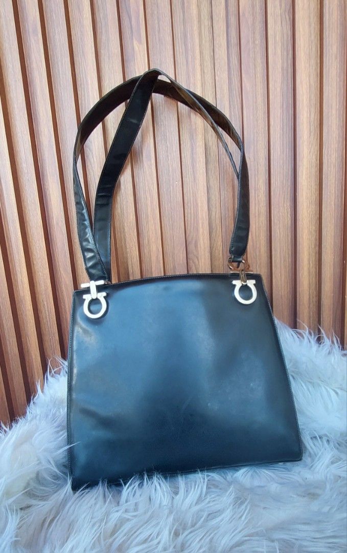 Vintage Salvatore ferragamo (Category: Luxury Bags & Wallets) located in Talavera. Submitted by trixielady08 (Listing ID 1354639122, Image 1). Description: coded naka salvatore ferragamo ang ilalim ng zipper may flaws❗️ bawal po ito sa maselan..para lang po sa mga collector🥰 flaws:natanggal ang tahi sa isang strap..kayo na po magpatahi. :di na po ganun kakintab ang patent leather nya..