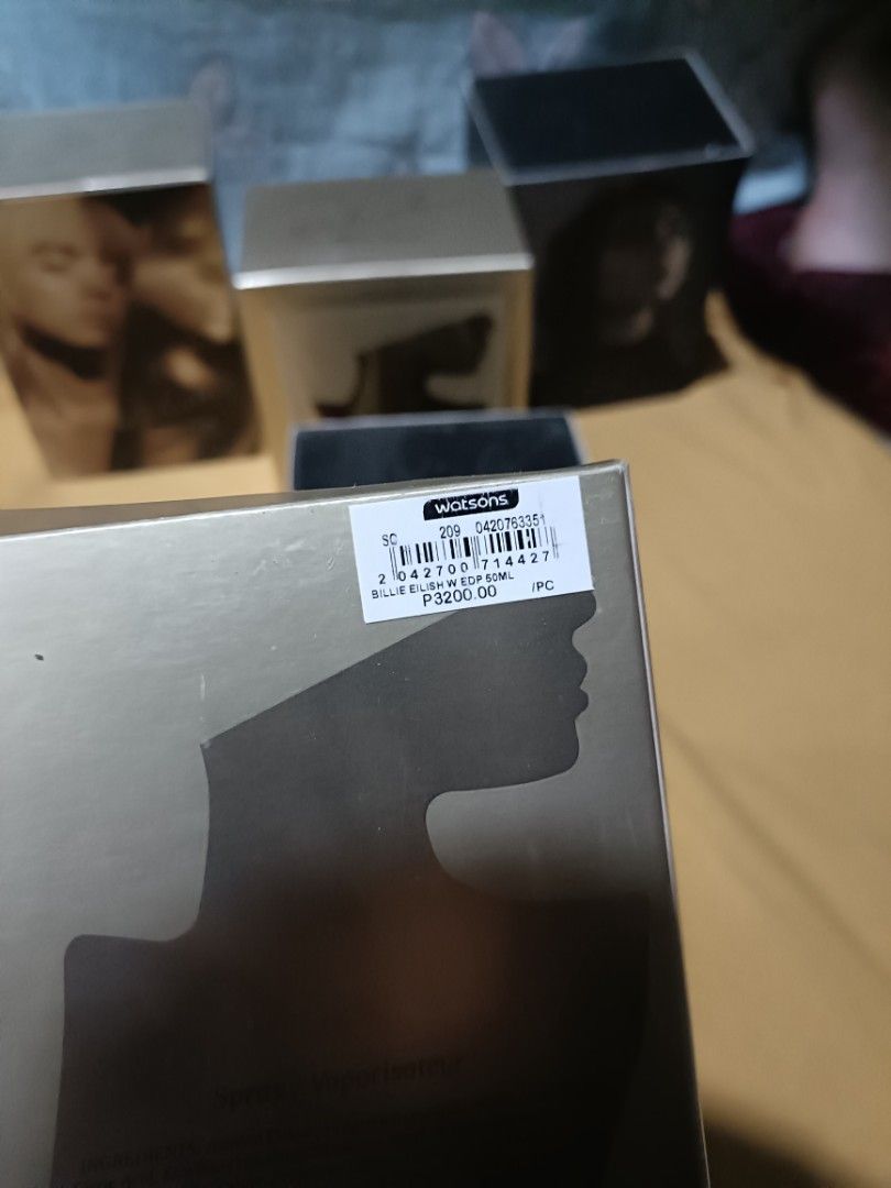 ORIGINAL Eilish by Billie Eilish 50ml (GOLD, NO. 1) (Category: Fragrance & Deodorants) located in Pasay City. Submitted by declutterwifmeee (Listing ID 1354800302, Image 2). Description: Eilish is a captivating Amber Gourmand featuring notes of sugared petals, creamy vanilla, and warm musks. Top Notes Red Berries, Mandarin, Sugared Petals Middle Notes Vanilla Bourbon, Soft Spices Accord, Cocoa Base Notes Warm Musk, Creamy Woods, Tonka -50 ml bott