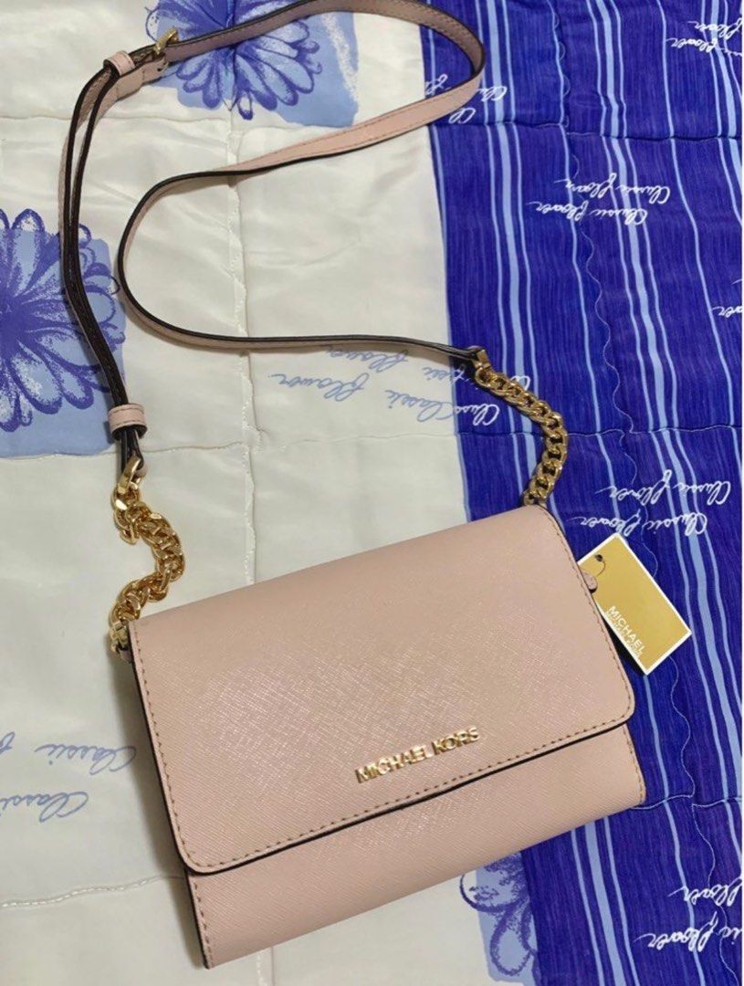 Crossbody or shoulder bag **MK** (Category: Luxury Bags & Wallets) located in Las Pinas. Submitted by srnsangga (Listing ID 1354778465, Image 1). Description: 100% AUTHENTIC still has tags bought in Canada with minor flaw, pen mark as seen on the 3rd pic ₱3,000, slightly negotiable.