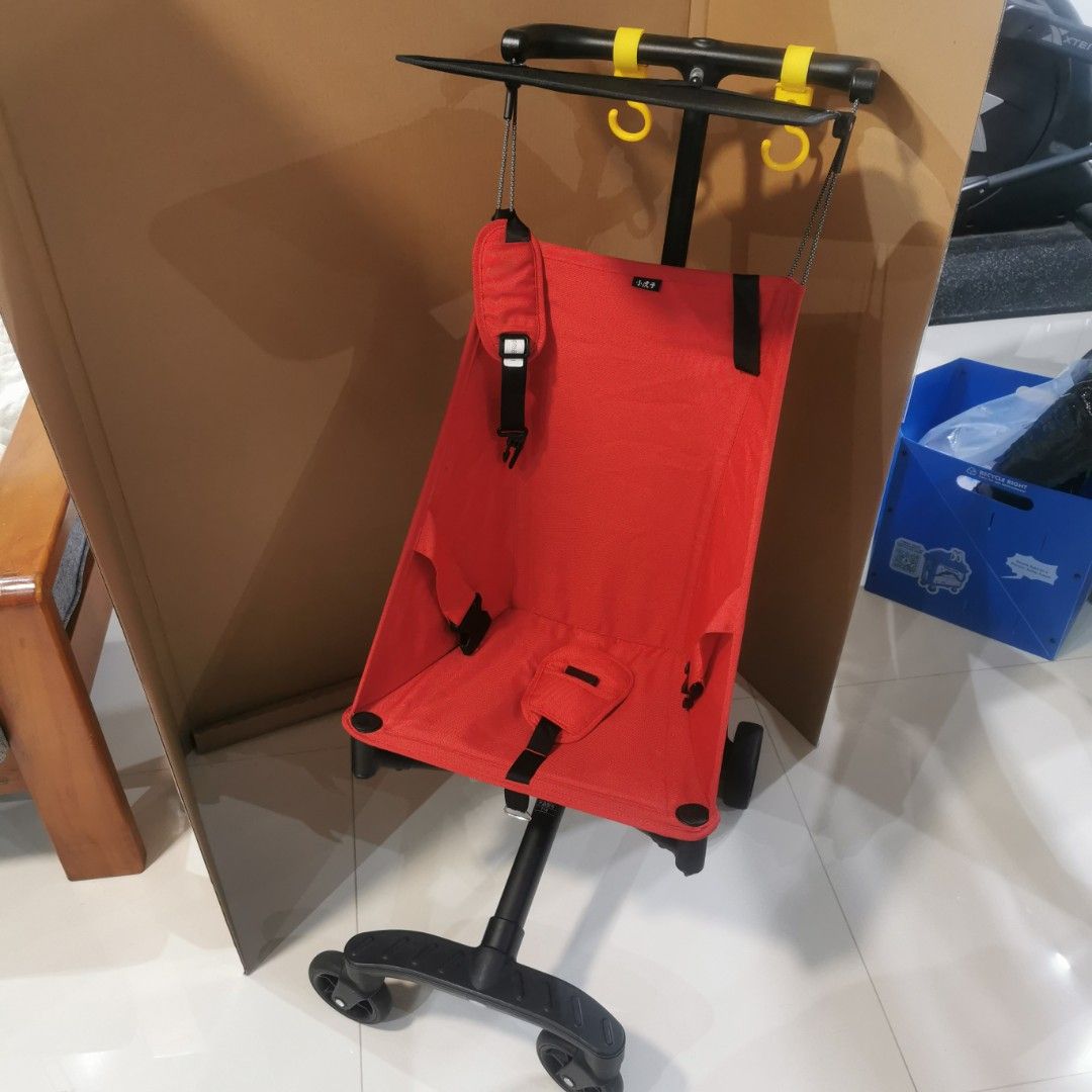 Folder stroller (Category: Strollers) located in Singapore. Submitted by stevejy (Listing ID 1354850331, Image 1). Description: Foldable red colour stroller Cabin Size 57cm x 32cm x 14 com 2.8 kg when folded Bottom footrest come with a blinking light when press Suitable for user weight up to 22 kg One hand folding Include an IKEA DIMPA storage bag for carry out.