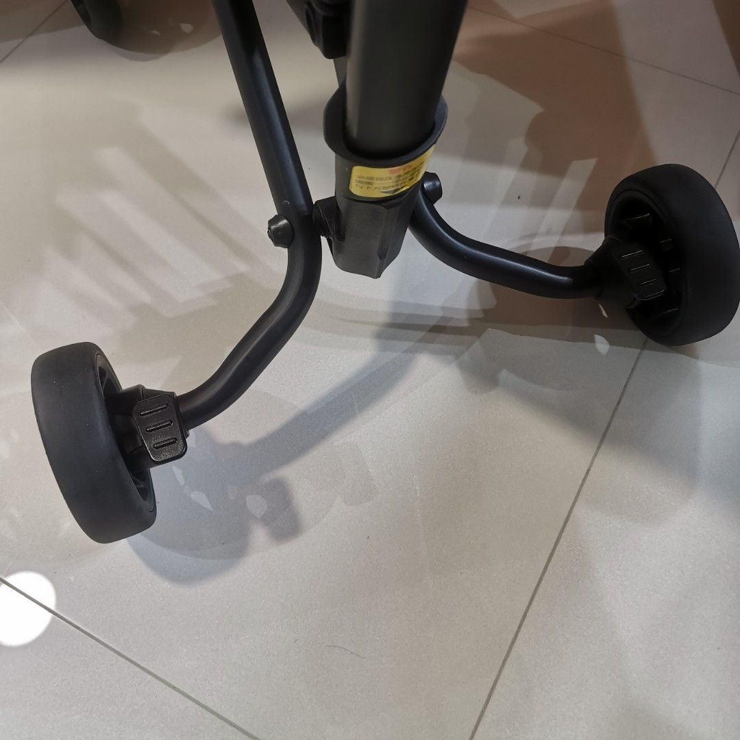 Folder stroller (Category: Strollers) located in Singapore. Submitted by stevejy (Listing ID 1354850331, Image 5). Description: Foldable red colour stroller Cabin Size 57cm x 32cm x 14 com 2.8 kg when folded Bottom footrest come with a blinking light when press Suitable for user weight up to 22 kg One hand folding Include an IKEA DIMPA storage bag for carry out.