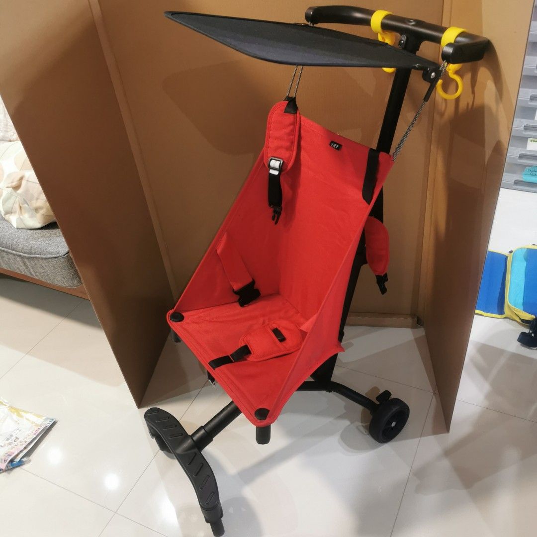 Folder stroller (Category: Strollers) located in Singapore. Submitted by stevejy (Listing ID 1354850331, Image 2). Description: Foldable red colour stroller Cabin Size 57cm x 32cm x 14 com 2.8 kg when folded Bottom footrest come with a blinking light when press Suitable for user weight up to 22 kg One hand folding Include an IKEA DIMPA storage bag for carry out.
