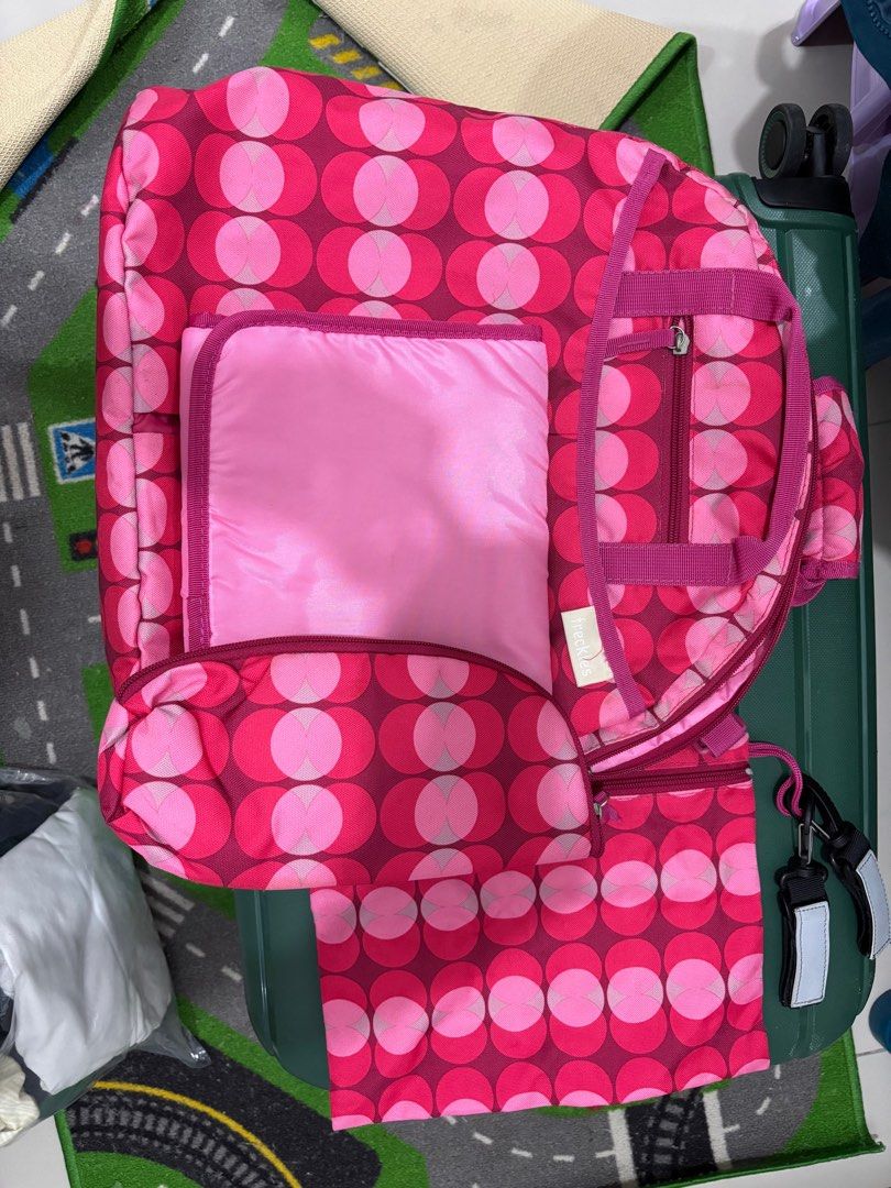 FRECKLES BACKPACK (MULTI-FUNCTIONAL) (Category: Other Baby Bathing & Changing Needs) located in Quezon City. Submitted by mariapreloveditems (Listing ID 1354903521, Image 1). Description: Backpack with multiple pockets. Inclusions: * Pouch * Bottle pouch * Changing mat Clean and good condition. Once or twice used. .