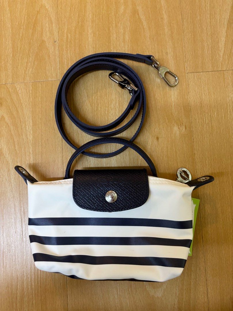 LONGCHAMP mini le pliage with strap. Limited edition (Category: Luxury Bags & Wallets) located in Makati City. Submitted by scarwee (Listing ID 1354765994, Image 1). Description: No flaws.