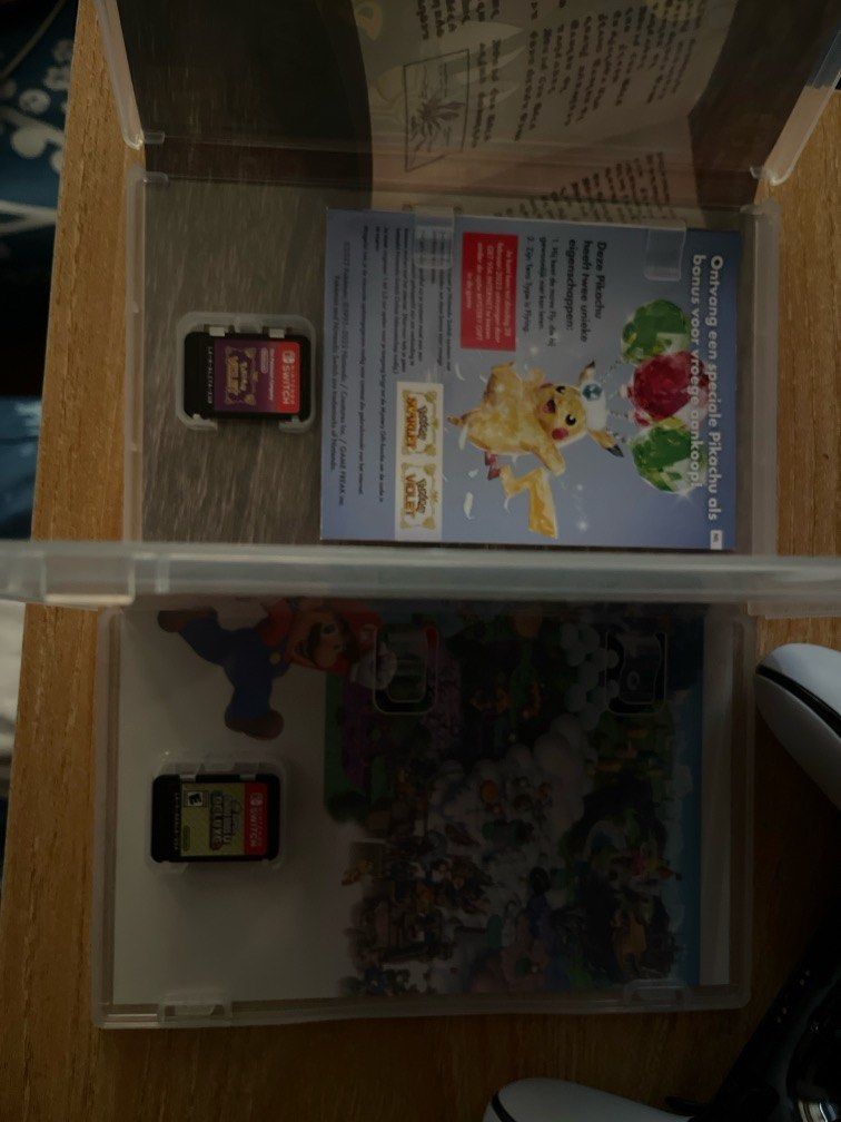 Mario Deluxe and Pokemon Violet each (Category: Nintendo) located in Quezon City. Submitted by czgadgets (Listing ID 1354844680, Image 2). Description: 1700 each. kept sa shelf. not much used since i play sa ps5. pick up shell v. luna. Test all you want.