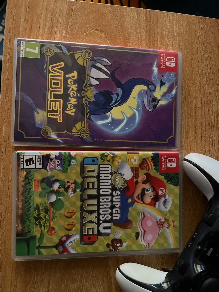 Mario Deluxe and Pokemon Violet each (Category: Nintendo) located in Quezon City. Submitted by czgadgets (Listing ID 1354844680, Image 1). Description: 1700 each. kept sa shelf. not much used since i play sa ps5. pick up shell v. luna. Test all you want.