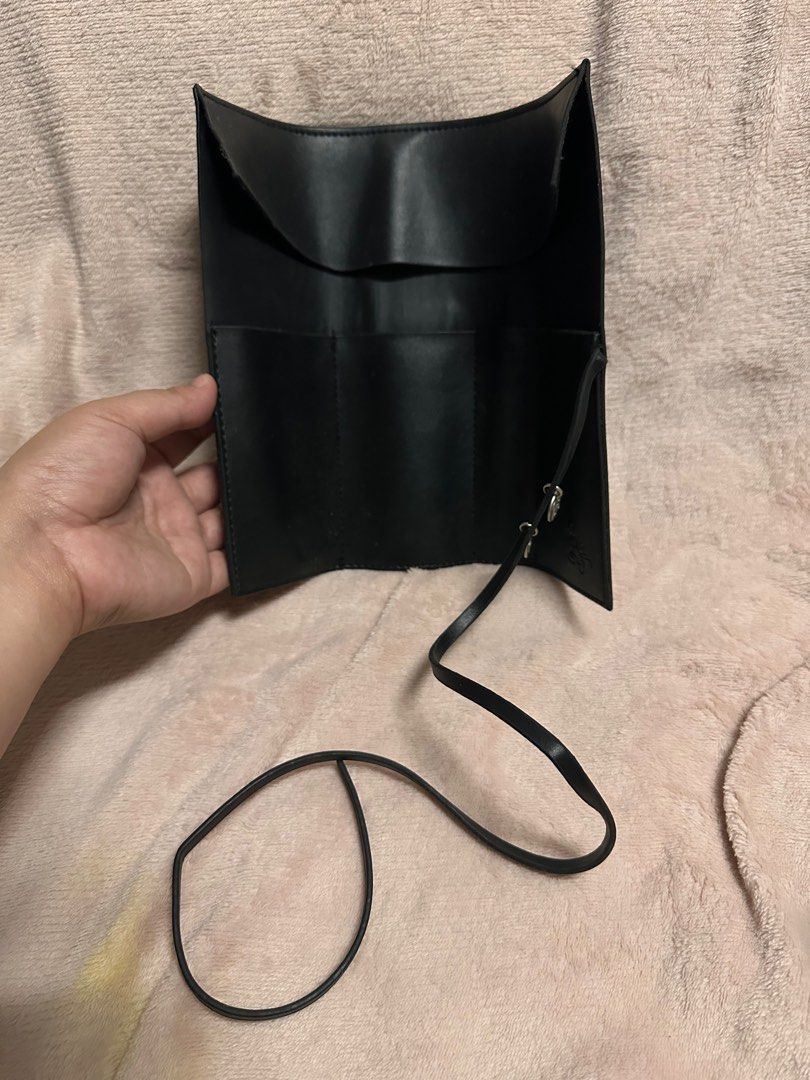 Mickey Mouse Rollable Leather Pouch (Category: Belt bags, Clutches and Pouches) located in Marikina City. Submitted by dearly__ (Listing ID 1354888286, Image 3). Description: Kept in the drawer. Unused. No damage at all. Leather undamaged.