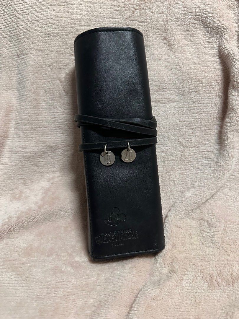 Mickey Mouse Rollable Leather Pouch (Category: Belt bags, Clutches and Pouches) located in Marikina City. Submitted by dearly__ (Listing ID 1354888286, Image 1). Description: Kept in the drawer. Unused. No damage at all. Leather undamaged.