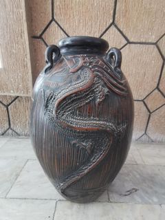 mid-century Chinese terracotta floor vase featuring a dragon design.