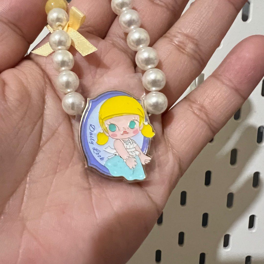 Molly daily look phone charm (Category: Charms) located in Taguig. Submitted by bloomingrosy (Listing ID 1354885942, Image 2). Description: never ginamit good con, with box, card and foil mop: gcash maya bank transfer mod: ggx, lbc or sdd loc: taguig.