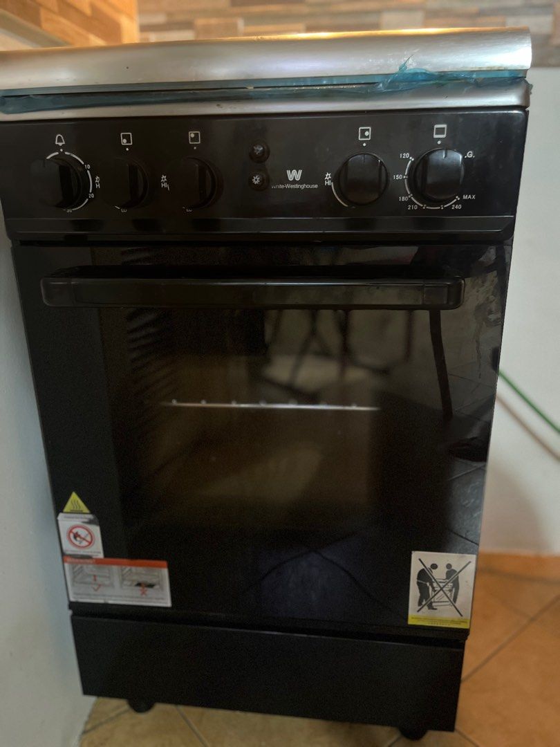 Oven range (brand new) (Category: Ovens & Toasters) located in Makati City. Submitted by rainnes18 (Listing ID 1354819857, Image 2). Description: White westing house(brand new) oven range can use electric or gas😊.