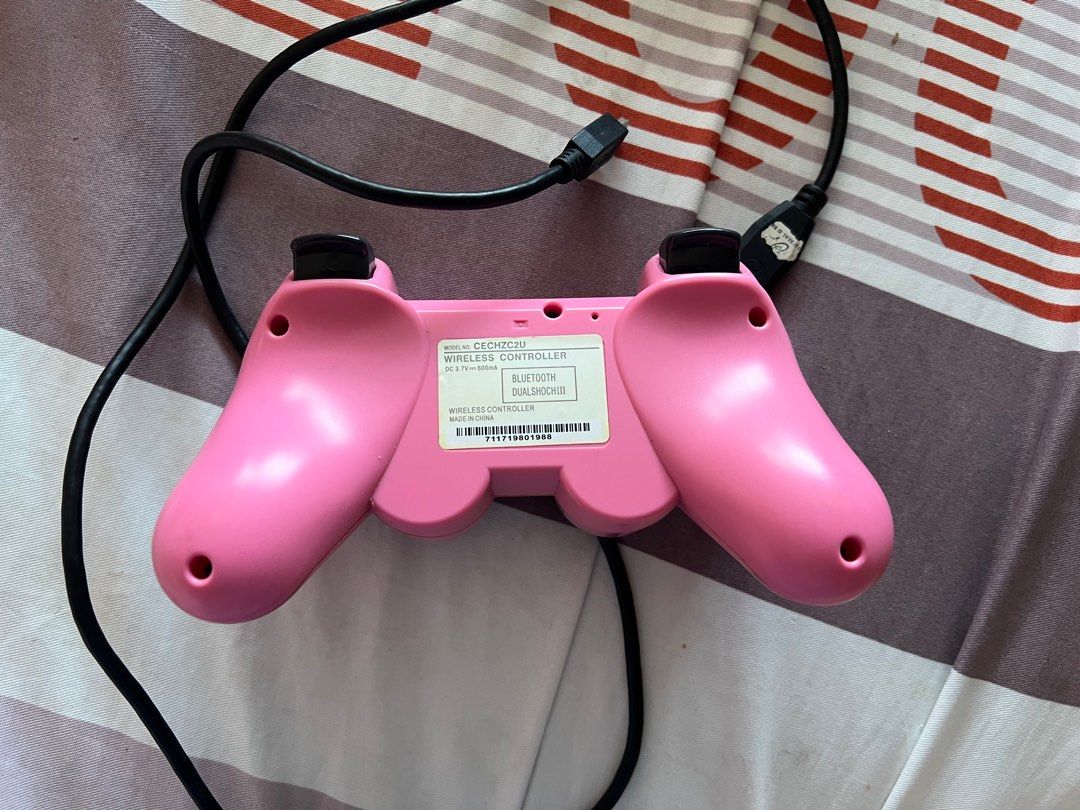 Pink PS3 controller with cable (Category: Controllers) located in Manila. Submitted by declutterforamari (Listing ID 1354808825, Image 2). Description: Please message for more pictures and details. Thank you :) .