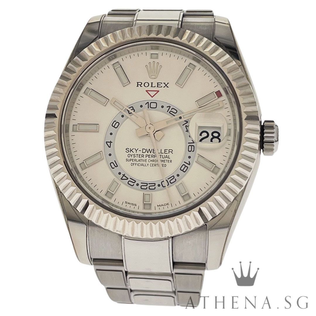 ROLEX ROLESOR OYSTER PERPETUAL ANNUAL CALENDAR GMT SKY DWELLER “AN” SERIES “WHITE DIAL” WITH CERT DATED (04/2019) 326934 (Category: Watches) located in Singapore. Submitted by athenawatches (Listing ID 1354806057, Image 1). Description: WLWRL_1736 Brand Rolex Model 326934 Series Alpha Numeric Colour of Dial White Dial with Luminescent Index Markers Bezel 18K White Gold Fluted, Bidirectional Rotatable Rolex Ring Command Bezel Case Diameter 42mm Ca